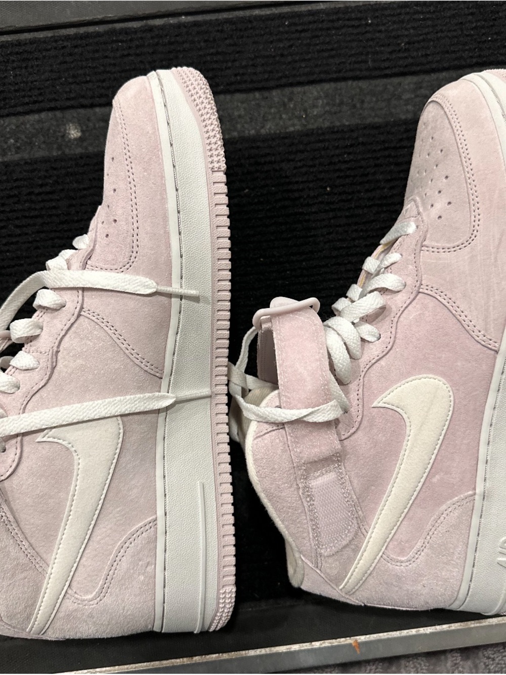 Nike Women's Light Pink Suede High-Top Sneakers with White Swoosh